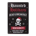 HAUNTED HOLIDAYS METAL SIGN