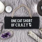 ONE CAT SHORT OF CRAZY WALL SIGN